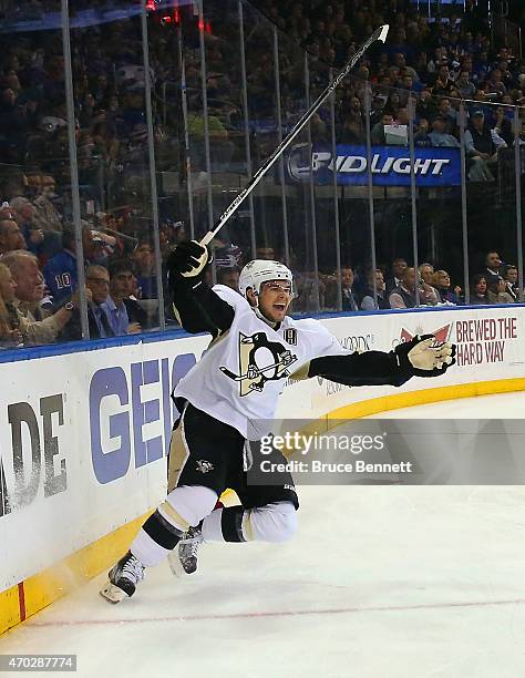 Chris Kunitz of the Pittsburgh Penguins celebrates his power play goal at 9:41 of the third period against the New York Rangers in Game One of the...