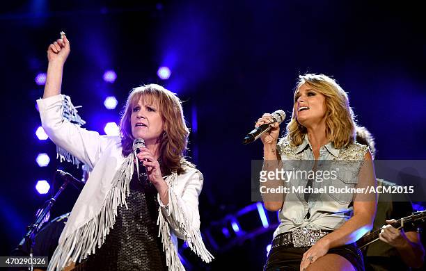 Singers Patty Loveless and Miranda Lambert perform onstage during ACM Presents: Superstar Duets at Globe Life Park in Arlington on April 18, 2015 in...