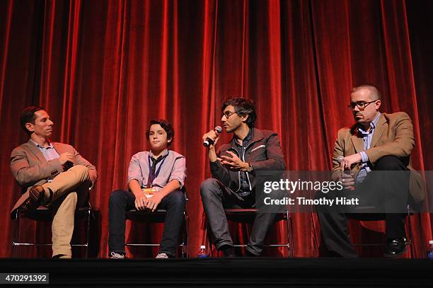 Scott Foundas, actor Noah Lomax, director Ramin Bahrani and Brian Tallerico speak onstage at the '99 HOMES' Screening during EBERTFEST 2015 at...