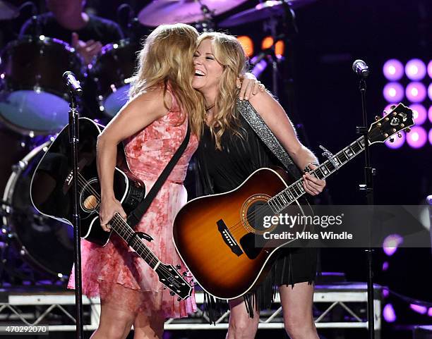 Singers Kimberly Perry of The Band Perry and Deana Carter perform onstage during ACM Presents: Superstar Duets at Globe Life Park in Arlington on...