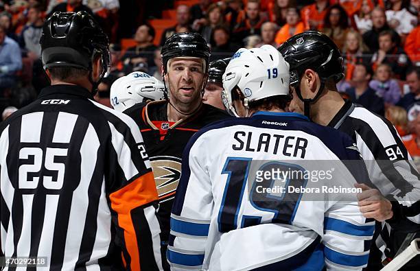 Clayton Stoner of the Anaheim Ducks exchanges words with Jim Slater of the Winnipeg Jets in Game Two of the Western Conference Quarterfinals between...