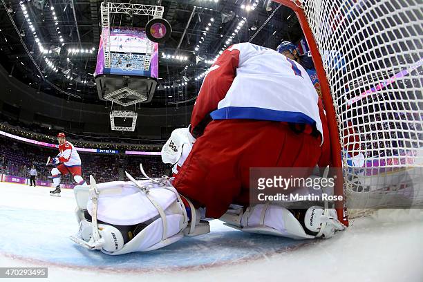Juhamatti Aaltonen of Finland scores a first-period goal against Semyon Varlamov of Russia during the Men's Ice Hockey Quarterfinal Playoff on Day 12...