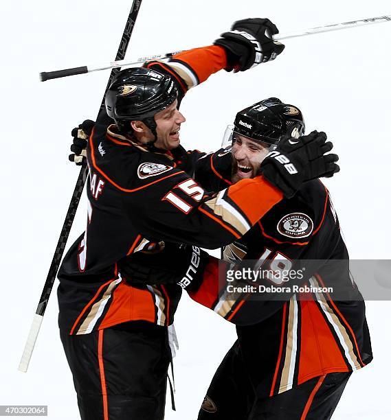 Ryan Getzlaf and Patrick Maroon of the Anaheim Ducks celebrate Maroon's third period goal against the Winnipeg Jets in Game Two of the Western...