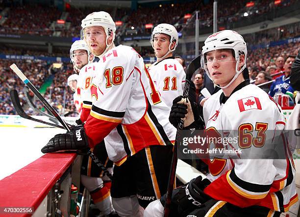 Sam Bennett of the Calgary Flames looks on from the bench during Game Two of the Western Conference Quarterfinals against the Vancouver Canucks...