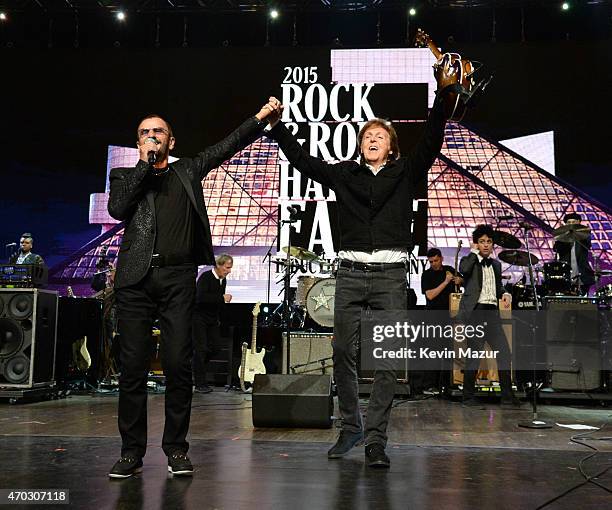 Paul McCartney and Ringo Starr perform onstage during the 30th Annual Rock And Roll Hall Of Fame Induction Ceremony at Public Hall on April 18, 2015...