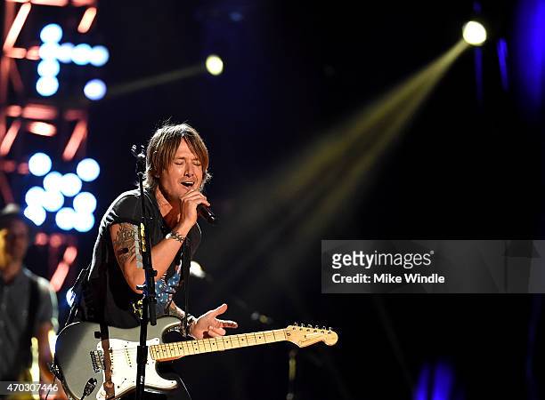 Musician Keith Urban performs onstage during ACM Presents: Superstar Duets at Globe Life Park in Arlington on April 18, 2015 in Arlington, Texas.