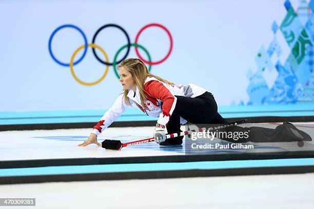 Jennifer Jones of Canada looks on after releasing the stone during the women's semifinal match between Great Britain and Canada at Ice Cube Curling...