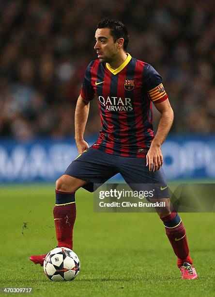 Xavi Hernandez of Barcelona in action during the UEFA Champions League Round of 16 first leg match between Manchester City and Barcelona at the...