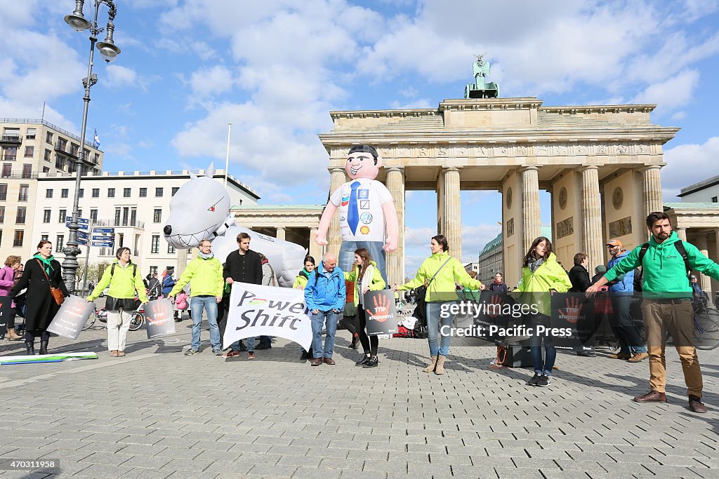 Activists create a protest chain between Potsdamer Platz...