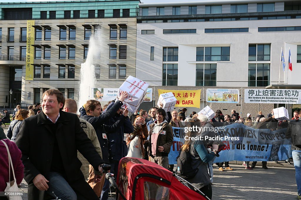 Activists create a protest chain between Potsdamer Platz...