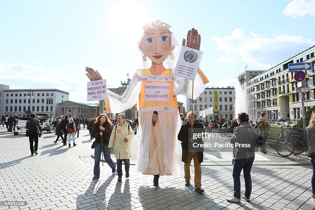 Activists create a protest chain between Potsdamer Platz...
