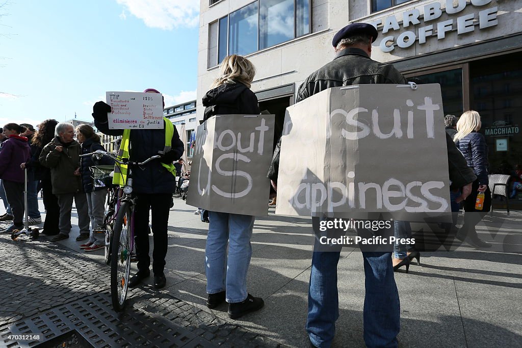 Activists create a protest chain between Potsdamer Platz...