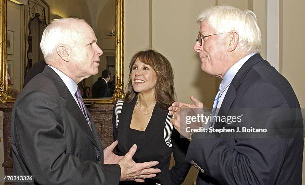 Left to right, Sen John McCain ,Marlo Thomas, Phil Donahue speak on Capitol Hill in Washington. Thomas testified before House Appropriations...