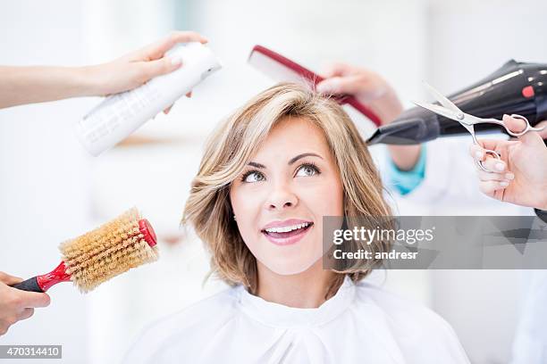 thoughtful woman at the hair salon - short hair cut stock pictures, royalty-free photos & images