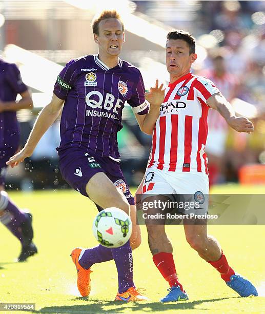 Michael Thwaite of Perth Glory and Robert Koren of Melbourne City contest the ball during the round 26 A-League match between the Perth Glory and...
