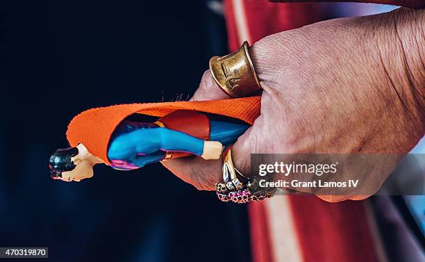 Roseanne Barr holds a Superman figure at the world premiere of documentary: 'Roseanne For President!' during the 2015 Tribeca Film Festival at SVA...