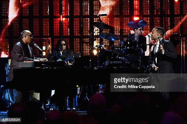 Stevie Wonder and John Legend perform onstage during the 30th Annual Rock And Roll Hall Of Fame Induction Ceremony at Public Hall on April 18, 2015...