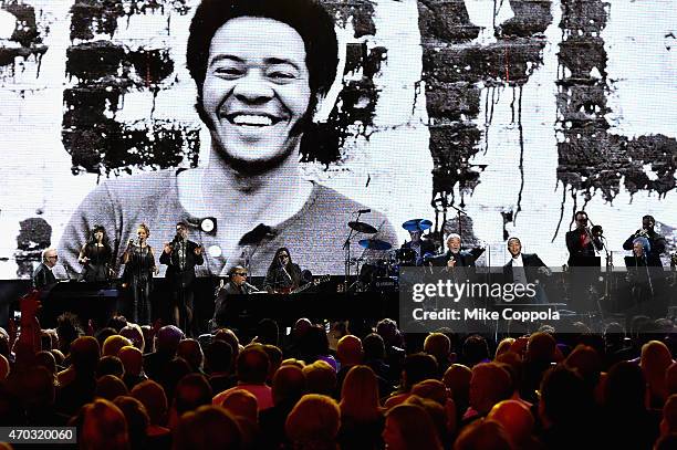 Stevie Wonder, Bill Withers, and John Legend perform onstage during the 30th Annual Rock And Roll Hall Of Fame Induction Ceremony at Public Hall on...