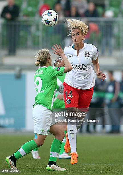 Kheira Hamraoui of Paris Saint-Germain vies with Anna Blaesse of Wolfsburg during the first UEFA Women's Champions League semi final match between...