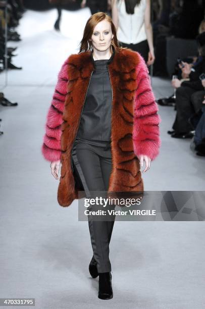 Karen Elson walks the runway at the Tom Ford show at London Fashion Week AW14 at The Lindley Hall on February 17, 2014 in London, England.