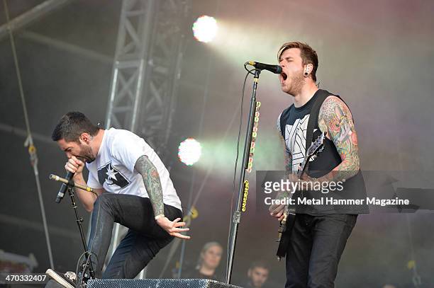 Vocalist Jeremy McKinnon and guitarist Neil Westfall of American hard rock group A Day To Remember performing live on the Zippo Encore Stage at...