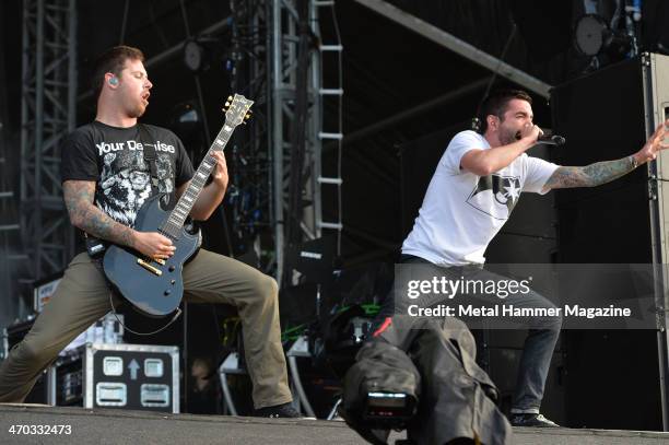 Vocalist Jeremy McKinnon and guitarist Kevin Skaff of American hard rock group A Day To Remember performing live on the Zippo Encore Stage at...