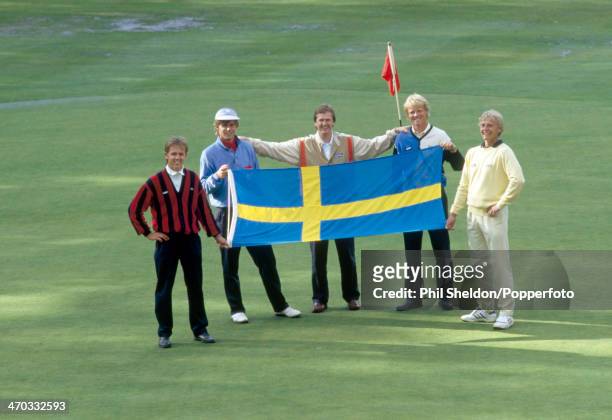 Swedish golfers holding up the Sweden flag during the PGA Championship held at the Wentworth Golf Club, Surrey, circa May 1986. From left to right:...