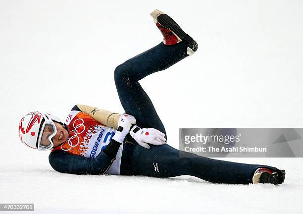 Taihei Kato of Japan crashes as he competes in the Nordic Combined Men's Individual LH on day 10 of the Sochi 2014 Winter Olympics at RusSki Gorki...
