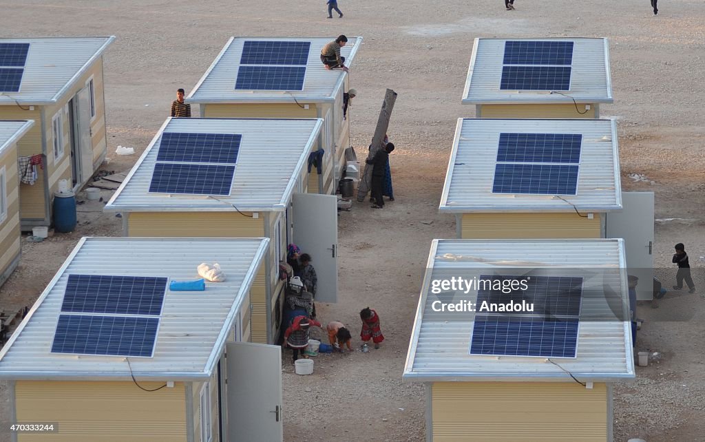 Refugees Using Solar Power Panels in Aleppo Refugee Camp