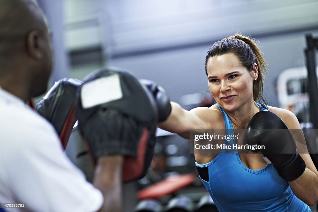 Female Wearing Boxing Gloves, Sparring in Gym