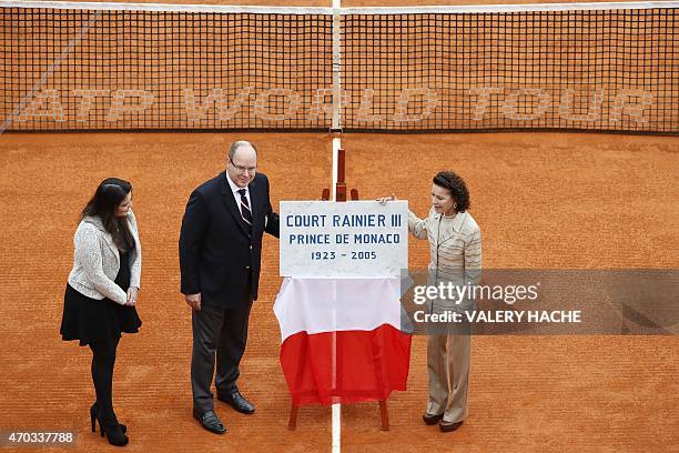 Prince Albert II of Monaco , his cousin Elisabeth-Anne de Massy and her daughter Melanie-Antoinette de Massy inaugrate the "Court Rainier III" during...