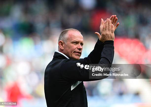 Inverness Caledonian Thistle manager John Hughes applauds during the William Hill Scottish Cup Semi Final match between Inverness Caledonian Thistle...