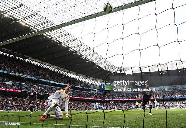 Adrian of West Ham watches as James collins of West Ham scores an own goal during the Barclays Premier League match between Manchester City and West...