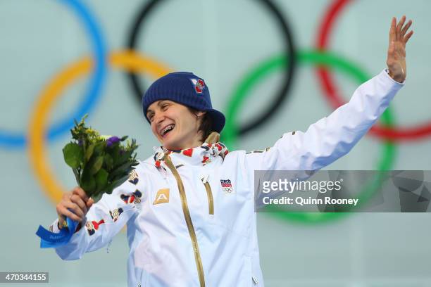 Gold medalist Martina Sablikova of the Czech Republic celebrates on the podium during the flower ceremony for the Speed Skating Women's 5000m on day...