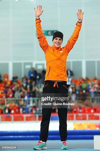Silver medalist Ireen Wust of the Netherlands celebrates during the flower ceremony for the Speed Skating Women's 5000m on day twelve of the Sochi...