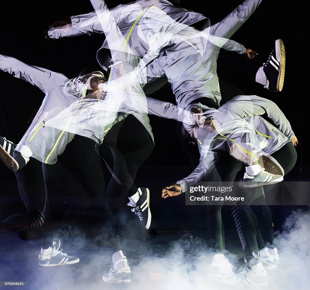 Multiple exposure of urban man jumping