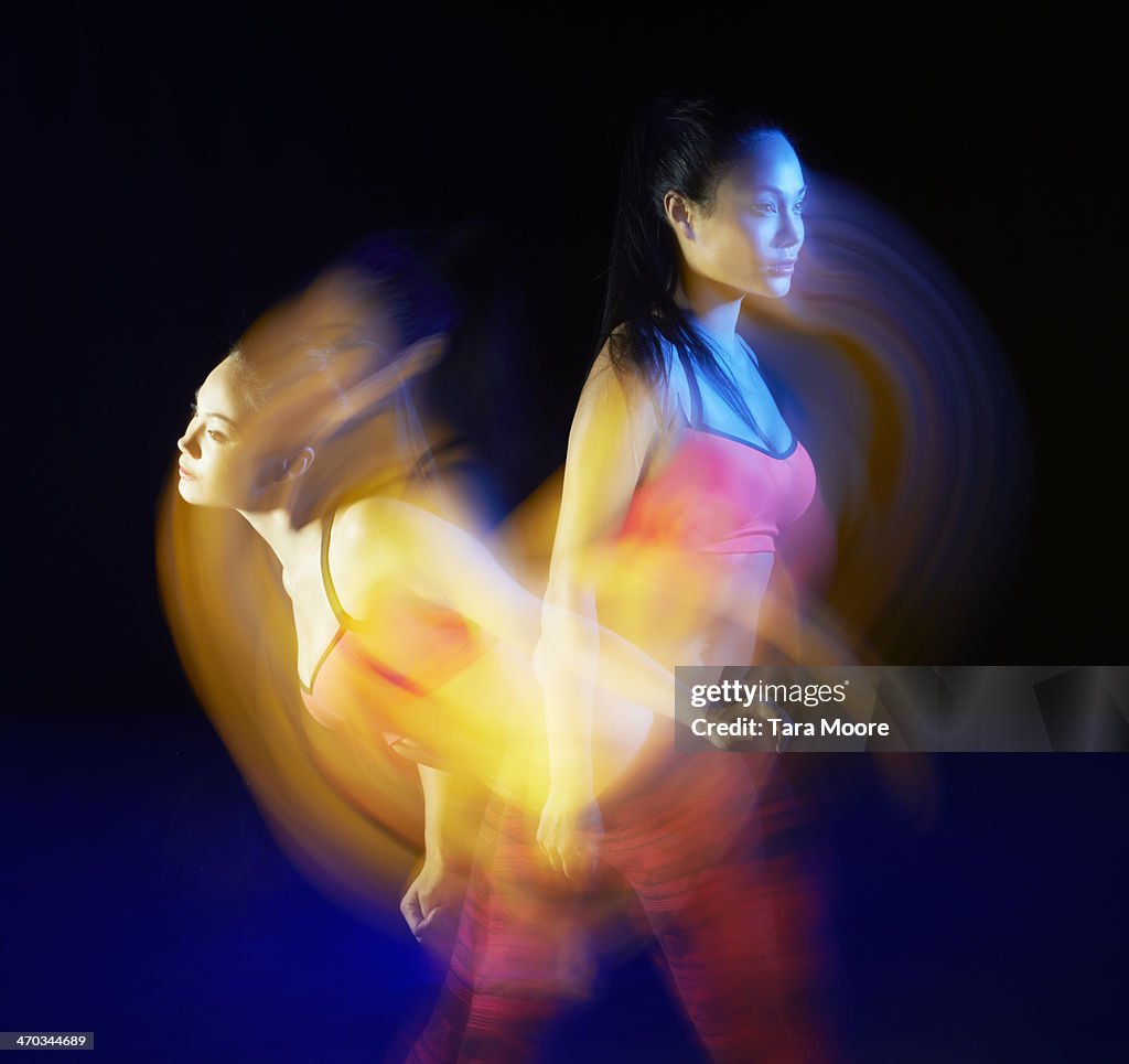 Sports woman exercising with motion blur