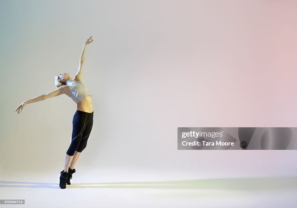 Urban ballet dancer in graceful pose