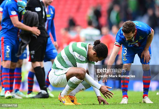 Graeme Shinnie of Inverness Caledonian Thistle consoles Virgil Van Dijk of Celtic at the final whistle during the William Hill Scottish Cup Semi...
