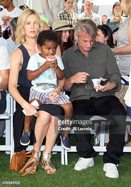 Charlize Theron, Jackson Theron and Sean Penn attends the generationOn West Coast Block Party on April 18, 2015 in Beverly Hills, California.