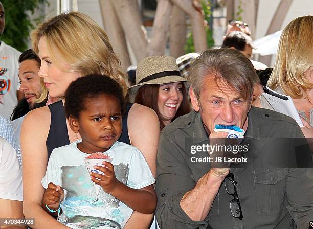 Charlize Theron, Jackson Theron and Sean Penn attend the generationOn West Coast Block Party on April 18, 2015 in Beverly Hills, California.