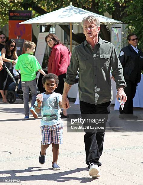 Jackson Theron and Sean Penn attend the generationOn West Coast Block Party on April 18, 2015 in Beverly Hills, California.