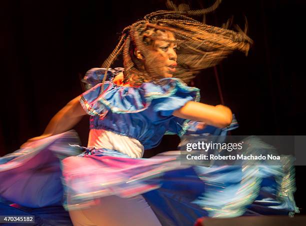 Faces of Yemaya: Dailyn Martinez dances Yemayawhich in Santeria is the Yorùbá Orisha or Goddess of the living Ocean, seen during the concert of David...