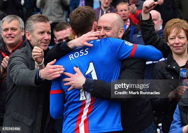 Nicolas Ross of Inverness Caledonian Thistle celebrates his teams famous victory over Celtic at full time with the traveling fans, during the William...