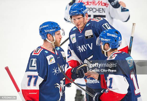 Nikolai Goc, Dennis Reul and Andrew Joudrey of the Adler Mannheim during the game between Adler Mannheim and ERC Ingolstadt on April 19, 2015 in...