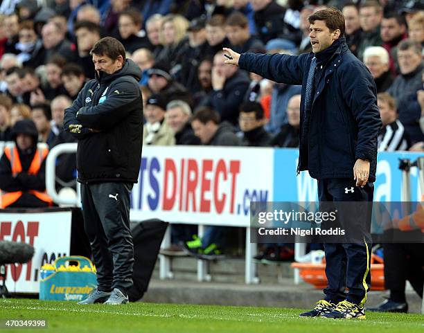 John Carver, manager of Newcastle United and Manager Mauricio Pochettino of Spurs on the touchline during the Barclays Premier League match between...