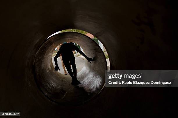 Competitor passes thru a tunnel during the first Belik Race on April 19, 2015 in Cabanillas del Campo, in the region of Guadalajara, Spain.