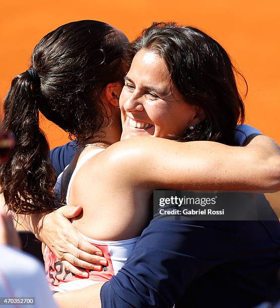 Conchita Martinez coach of Spain and Lara Arruabarrena of Spain celebrate after winning the round 3 match between Paula Ormaechea of Argentina and...