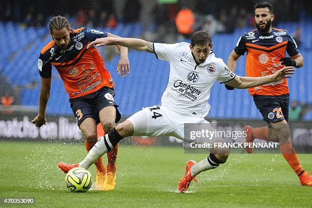 Caen's Argentinian forward Emiliano Sala vies with Montpellier's French defender Daniel Congre during the French L1 football match between...