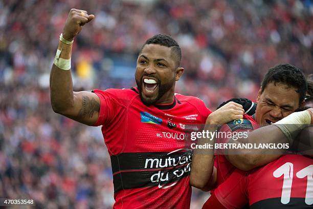 Toulon's fullback Delon Armitage gestures as he congratulates RC Toulon's winger Bryan Habana who scored a try during the European Champions Cup...